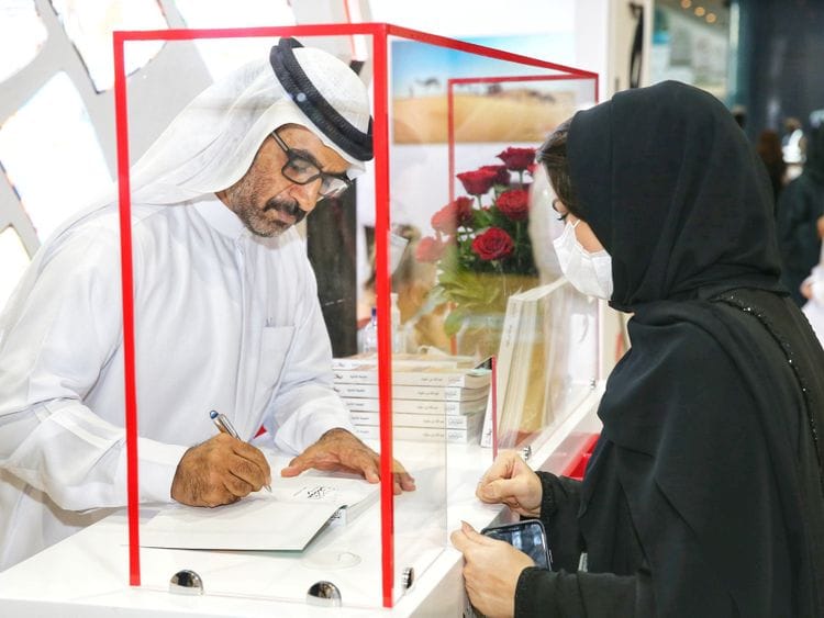 Bin Dalmook - HHC Ceo during the book signing ceremony at ADIBF-1622301066529