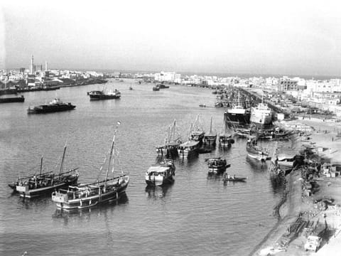Dhows on the Dubai Creek. From a cluster of villages on the Arabian Peninsula engaged in pearl diving and spice trading, a nation has emerged with enviable economic strength.