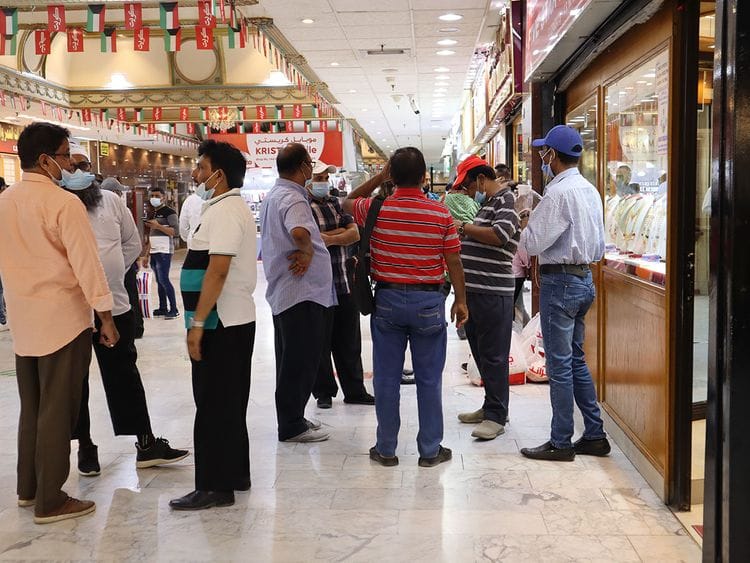 Stock Kuwait people expats skyline
