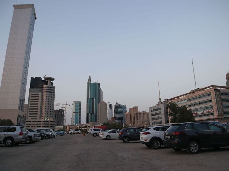 Stock Kuwait people expats skyline