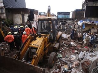 Photos: Building collapse kills 11 after monsoon flooding in Mumbai
