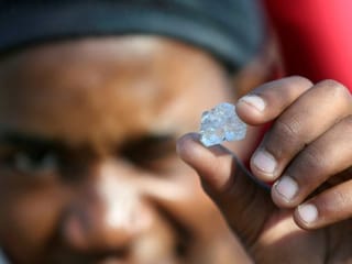 'Diamond rush' grips South African village after discovery of unidentified stones