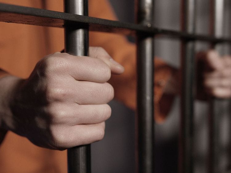 STOCK jailed prison handcuff crime arrest