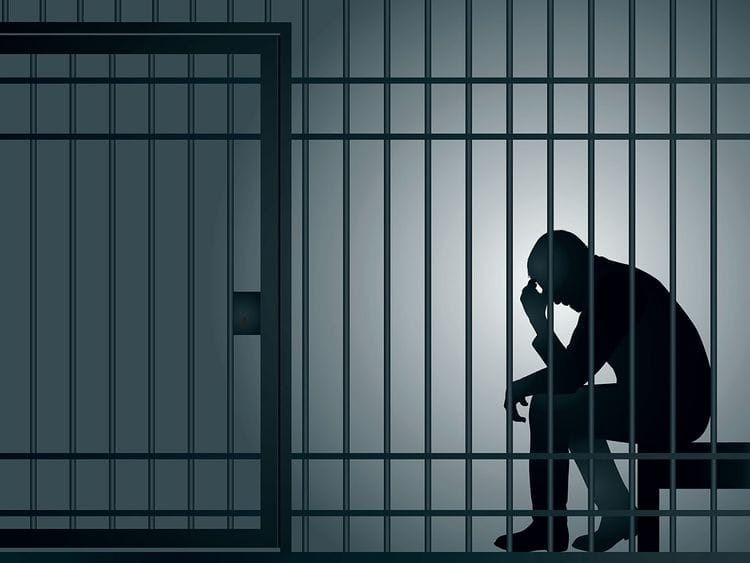 STOCK jailed prison handcuff crime