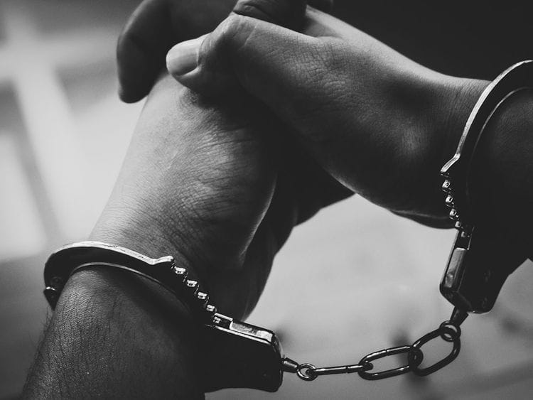 STOCK jailed prison handcuff crime arrest