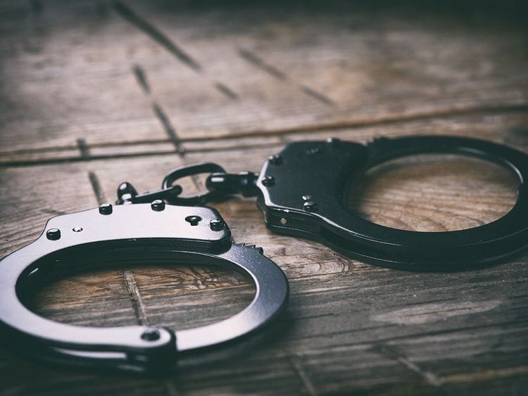 STOCK jailed prison handcuff crime