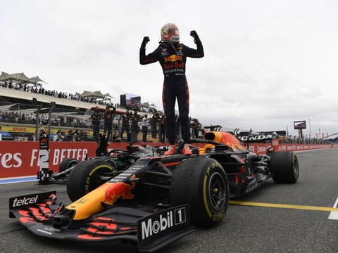 Red Bull's Max Verstappen celebrates after winning the French Grand Prix.