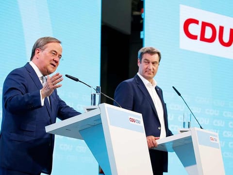Christian Democratic Union (CDU) leader Armin Laschet and Christian Social Union (CSU) leader Markus Soeder hold a news conference after a party congress in Berlin, on June 21, 2021. 