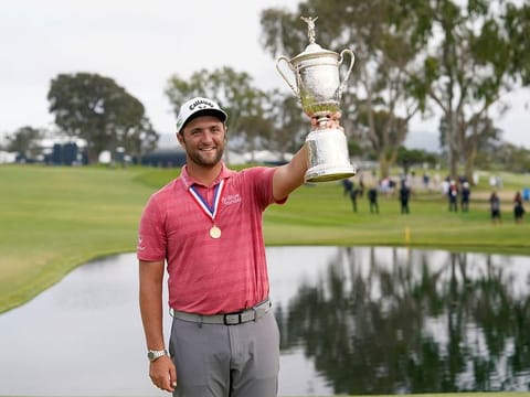 Jon Rahm celebrates with the trophy after winning the US Open at Torrey Pines 