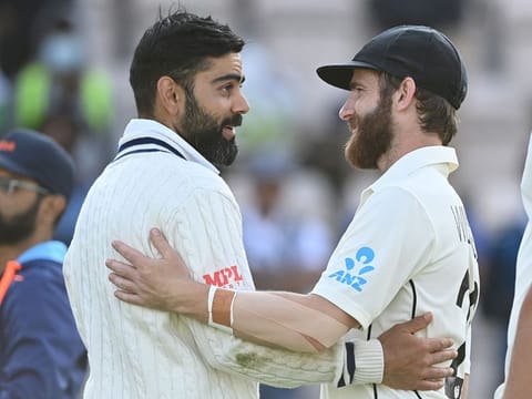 India's Virat Kohli (left) congratulates New Zealand's captain Kane Williamson on the final day of the ICC World Test Championship final at the Ageas Bowl in Southampton, southwest England, on June 23, 2021. New Zealand beat India by 8 wickets. 