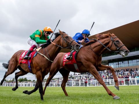 Hurricane Lane wins the Dubai Duty Free Irish Derby under William Buick 