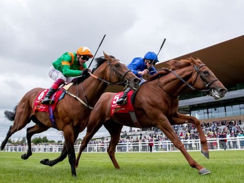 Hurricane Lane wins the Dubai Duty Free Irish Derby under William Buick 