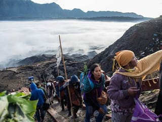 Photos: Thousands climb Indonesian volcano for ritual sacrifice