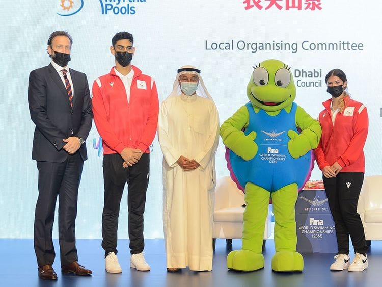 Swimmers Youssef Al Matrooshi and Layla Al Khatib with Brent Nowicki of Fina and Abu Dhabi Sports Council's Aref Hamad Al Awani and Dana the Hawksbill Turtle,  to launch the Fina Abu Dhabi World Swimming Championships.