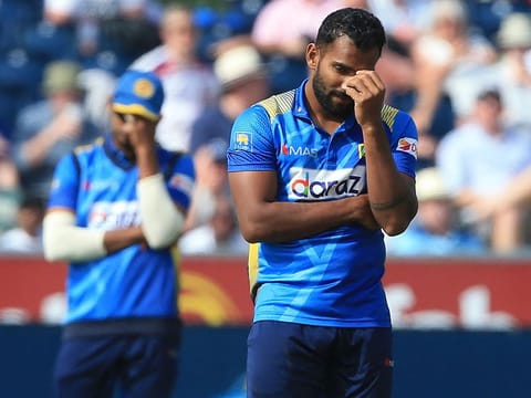 Sri Lankan bowler Chamika Karunaratne reacts during the first One-day International against England at Riverside Ground, Chester-le-Street, north England on Tuesday. The visitors lost the match by five wickets.
