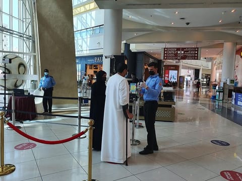 Visitors being scanned at the entrance of Al Wahda Mall in Abu Dhabi.