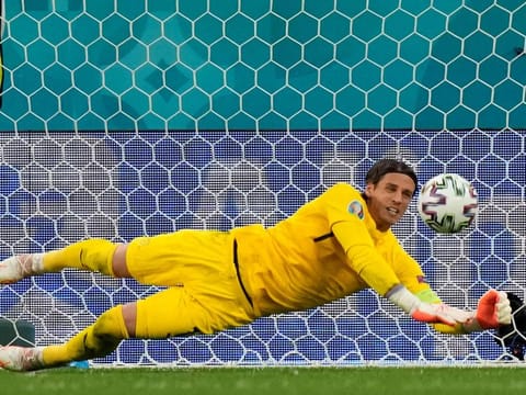 Switzerland's goalkeeper Yann Sommer saves the ball during the Uefa Euro 2020 quarterfinal football match against Spain at the Saint Petersburg Stadium in Russia on July 2, 2021.