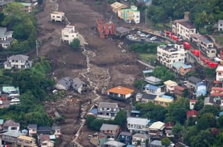 In pictures: Japan searches for dozens missing in mudslide