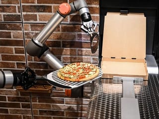 Photos: Paris gets a taste of pizza-making robots