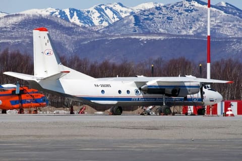 A Russian An-26 aircraft with the tail number RA-26085 on the apron at the airport of Patropavlovsk-Kamchatckiy. 