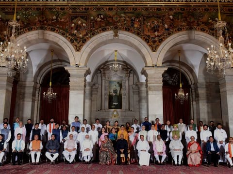 The newly sworn in ministers pose with Indian Prime Minister Narendra Modi, sixth left in front row, and other senior ministers at the Presidential Palace in New Delhi, India, Wednesday, July 7, 2021.