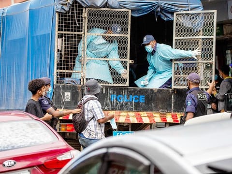 Police making arrests as they enforce face mask and social distancing protocols in Fiji's capital Suva, amid a worsening outbreak of the Delta variant of COVID-19 in the South Pacific nation. 