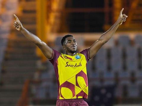 Obed McCoy of West Indies celebrates the dismissal of Mitchell Starc of Australia during the 1st T20I between Australia and West Indies at Darren Sammy Cricket Ground, Gros Islet, Saint Lucia, on July 9, 2021. 