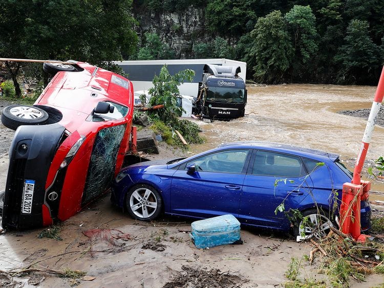 Cars destroyed by flood , following heavy rainfalls and flooding in Schuld, Germany, on July 15, 2021. 