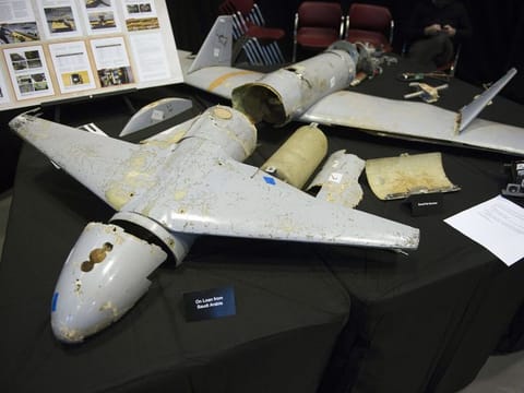 This file photo shows the remains of an Iranian Qasef-1 Unmanned Aerial Vehicle, used as a one-way attack to dive on targets and then detonating its warhead, which was fired by Yemen into Saudi Arabia. 