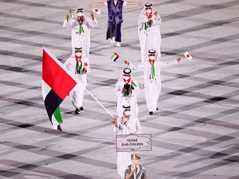 Yousuf Al Matrooshi carries the UAE flag at the Tokyo 2020 opening ceremony 