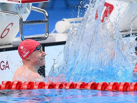 Britain's Tom Dean celebrates after winning the final of the men's 200m freestyle 