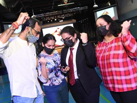 Kaavya Kalani (third from left) celebrates with her family. 