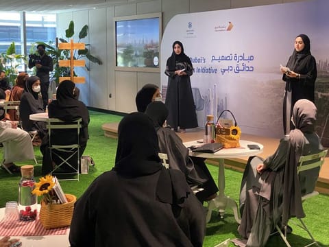 Mahra Salem Al Shamsi (left) and Aisha Abdul Rahim Abualshawareb announce the parks' redesign project. 