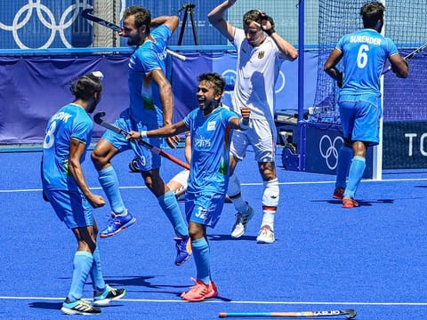 Indian players celebrate after defeating Germany 5-4 in the men's field hockey bronze medal match, at the 2020 Summer Olympics, in Tokyo, on August 5, 2021. 
