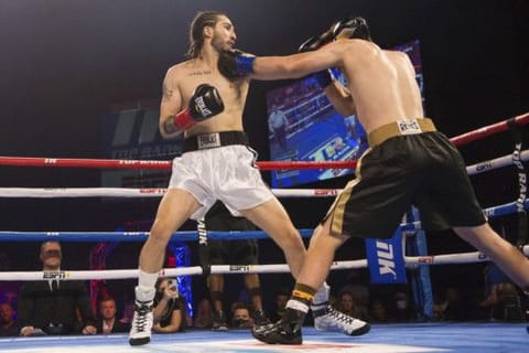 Nico Ali Walsh (left) fights Jordan Weeks during their Middleweight fight at the Hard Rock Casino Theater in Catoosa.