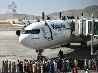 Photos: Chaotic scenes grip Kabul's Airport
