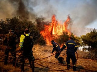In pictures: Wildfires rage across the globe