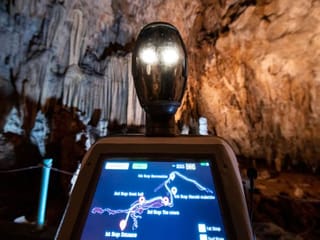 Photos: Persephone, the robot guide, leads visitors in a Greek cave