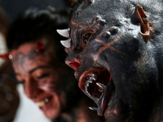 'The sinister attracted me': Brazilian tattoo artist morphs into devil look-alike 