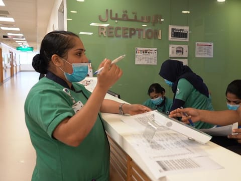 Anumol Jose walks in just in time to meet the night shift of nurses preparing to leave and the incoming morning shift