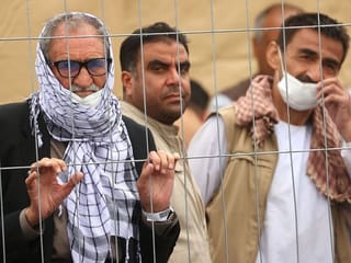 Photos: Thousands of Afghan refugees housed in temporary shelters