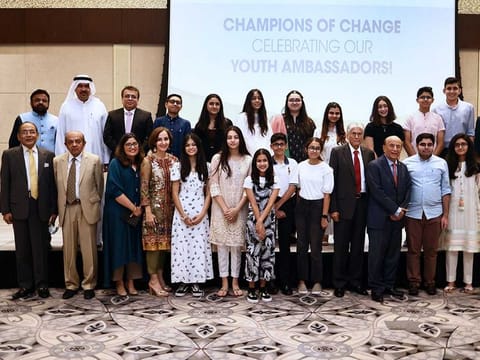 Fifteen Pakistan youth ambassadors in UAE pose for a picture with officials at the Youth Ambassadors Certificate Ceremony on 2nd September, 2021. 