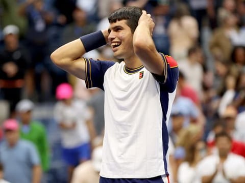 Carlos Alcaraz of Spain celebrates after defeating Stefanos Tsitsipas of Greece during his Men's Singles third round match on Day Five at USTA Billie Jean King National Tennis Center in New York City.