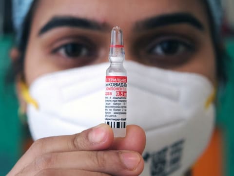 A nurse shows a vial of the Sputnik V Covid-19 vaccine. The booster shot was approved for use among all over-18s at least six months after receiving their second dose of the Sputnik V vaccine.