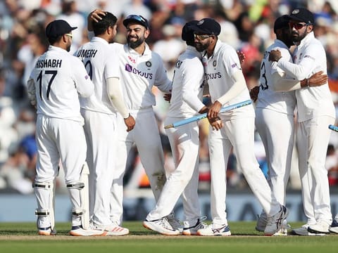 India captain Virat Kohli celebrates with teammates after winning Fourth Test match against England at The Oval, in London on Monday. 