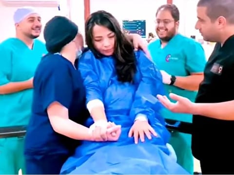 The doctors sing to the patient in Egypt.