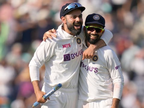 India’s captain Virat Kohli and his deputy Ajinkya Rahane celebrate after India beat England by 157 runs on day five of the fourth Test match at The Oval cricket ground in London on September 6, 2021.
