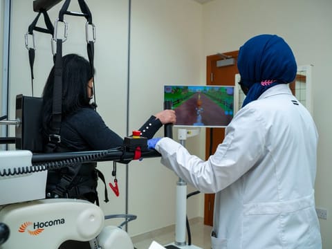 The Lokomat device helps to support the body’s walking movements, with patients’ legs guided to achieve normal muscle movements while on a treadmill. 