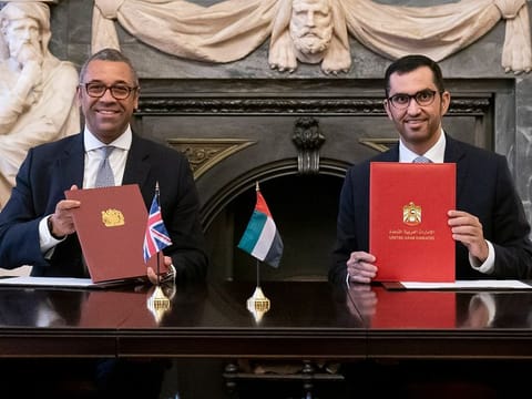 Left to Right: Rt Hon James Cleverly MP, UK Minister of State for Middle East and North Africa and Dr Sultan Al Jaber, UAE Minister of Industry and Advanced Technology and Special Envoy for Climate, at the signing ceremony.