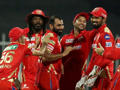 Mohammed Shami of the Punjab Kings celebrates the wicket of David Warner of the Sunrisers Hyderabad during the IPL match at the Sharjah Cricket Stadium on September 25, 2021.
